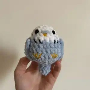 Perruche en crochet personnalisée aux couleurs d'une vraie perruche